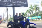 CLIENTE RECEBENDO SUA MOTO