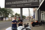 CLIENTE RECEBENDO SUA MOTO